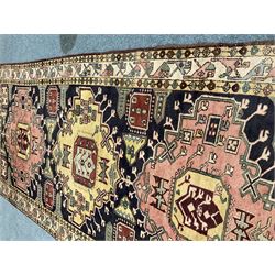 Turkish design blue and beige ground rug, triple medallion, repeating border