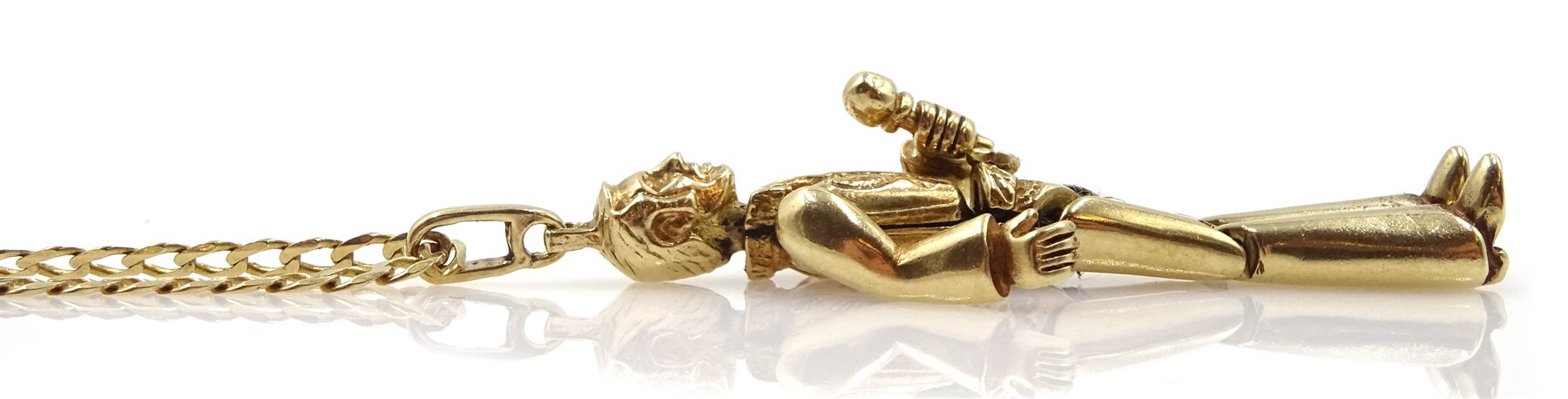 Gold Elvis Presley pendant, on gold flattened curb chain, both hallmarked 9ct