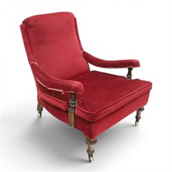 Victorian walnut framed reading open armchair of reclined position, the high sprung back a...
