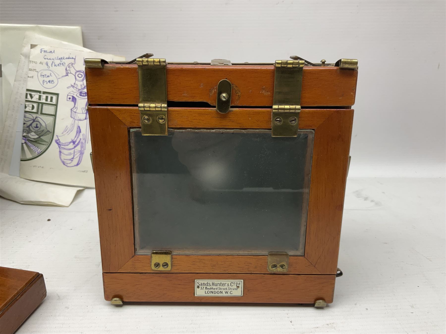 Sands Hunter & Co Ltd folding 1/4 plate camera in mahogany and lacquered brass, with two lenses and leather case