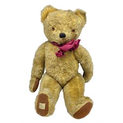 Large post-war Chad Valley plush covered teddy bear with revolving head, applied eyes, vertically stitched nose and mouth, jointed limbs and growler mechanism; stitched label to right foot and Hygenic Toys label to right side H73cm