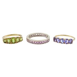 Gold five stone tanzanite ring, white gold pink sapphire full eternity ring and a five stone peridot ring, all hallmarked 9ct