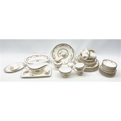 Royal Doulton Canton pattern tea and dinner wares, comprising six dinner plates, six salad plates, six side plates, six small bowls, sauce boat and stand, two oval serving dishes six teacups and six saucers, open sucrier, milk jug, cake plate, sandwich plate, pin dish, and small bud vase. 