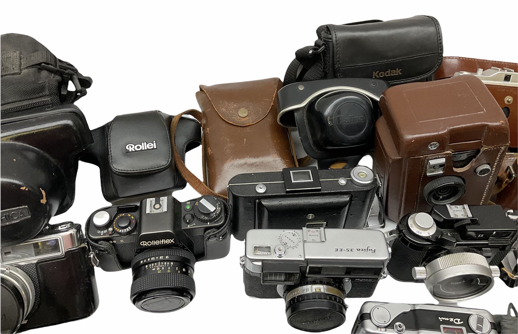 Collection of cameras, to include three Olympus Trip 35,  Balda Super Baldax, Seagull 4A TLR Camera, Pentax MG, Pentax-MV1, Yashica, two Yashica Electro 35, Rollei B35, Fujica 35 EE etc. 