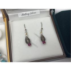 Eight pairs of silver and silver stone set earrings, all boxed
