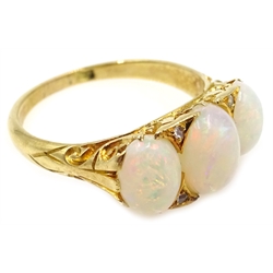  Gold three stone opal and diamond ring, stamped 18  