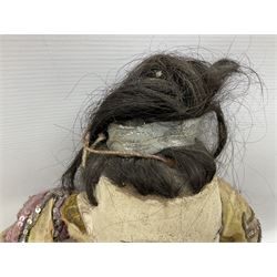 Large string puppet, probably Thai or Burmese, modelled as a woman in traditional costume embellished with sequins, the painted head with articulated mouth, the wood body and hands jointed, L70cm