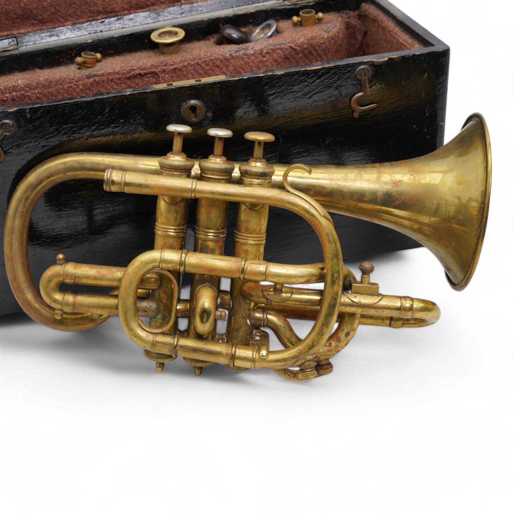 Early 20th Century brass cornet by R. De Lacy of 84 Holland Road, Brixton, London and Paris, in original ebonised case