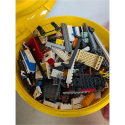 Collection of Lego, including built Bionicles Mistika models with instructions, loose Lego pieces, Lego Beatles Abbey Road canvas print and a Lego head storage box