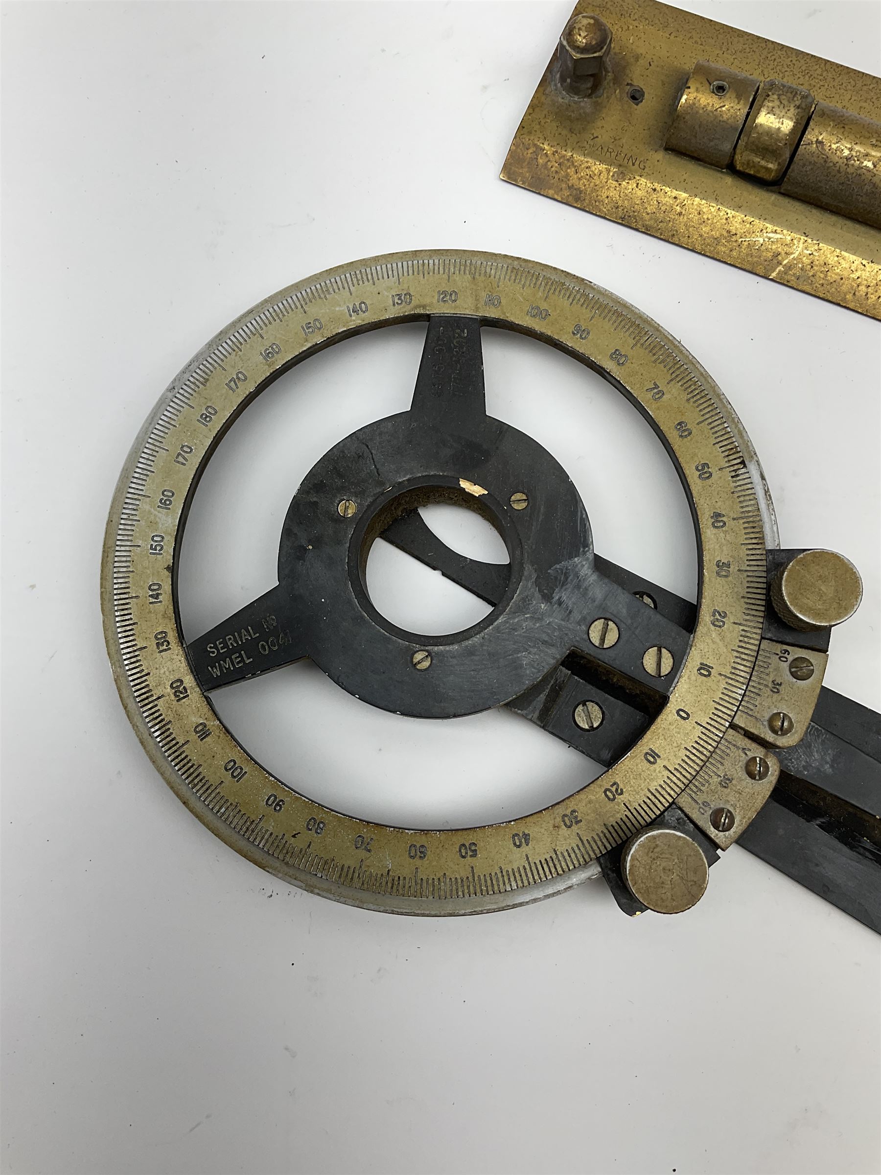 Brass and black painted maritime station pointer inscribed 6675-99-777-3202 Serial No.WMEL 0041 L45.5cm; Harling brass rolling ruler Patt.No.160100; and a parallel ruler; all unboxed (3)