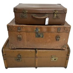 Collection of three 20th century travelling trunks, the largest - W85cmm D53cm, H35cm