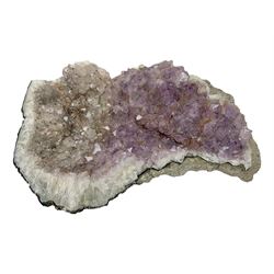 Amethyst crystal geode cluster, with well-defined crystals of various sizes, H13cm, L46cm