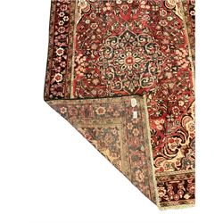 Persian red and beige ground rug, all-over pattern with repeating border