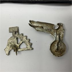 Three Reichsfuhrer 'SS' cuff titles; RZM 'SS' paper tag; German Water Police belt buckle; Destroyers badge marked RKS verso; N.S.B.O. lapel badge; and incomplete party eagle cap badge (8)