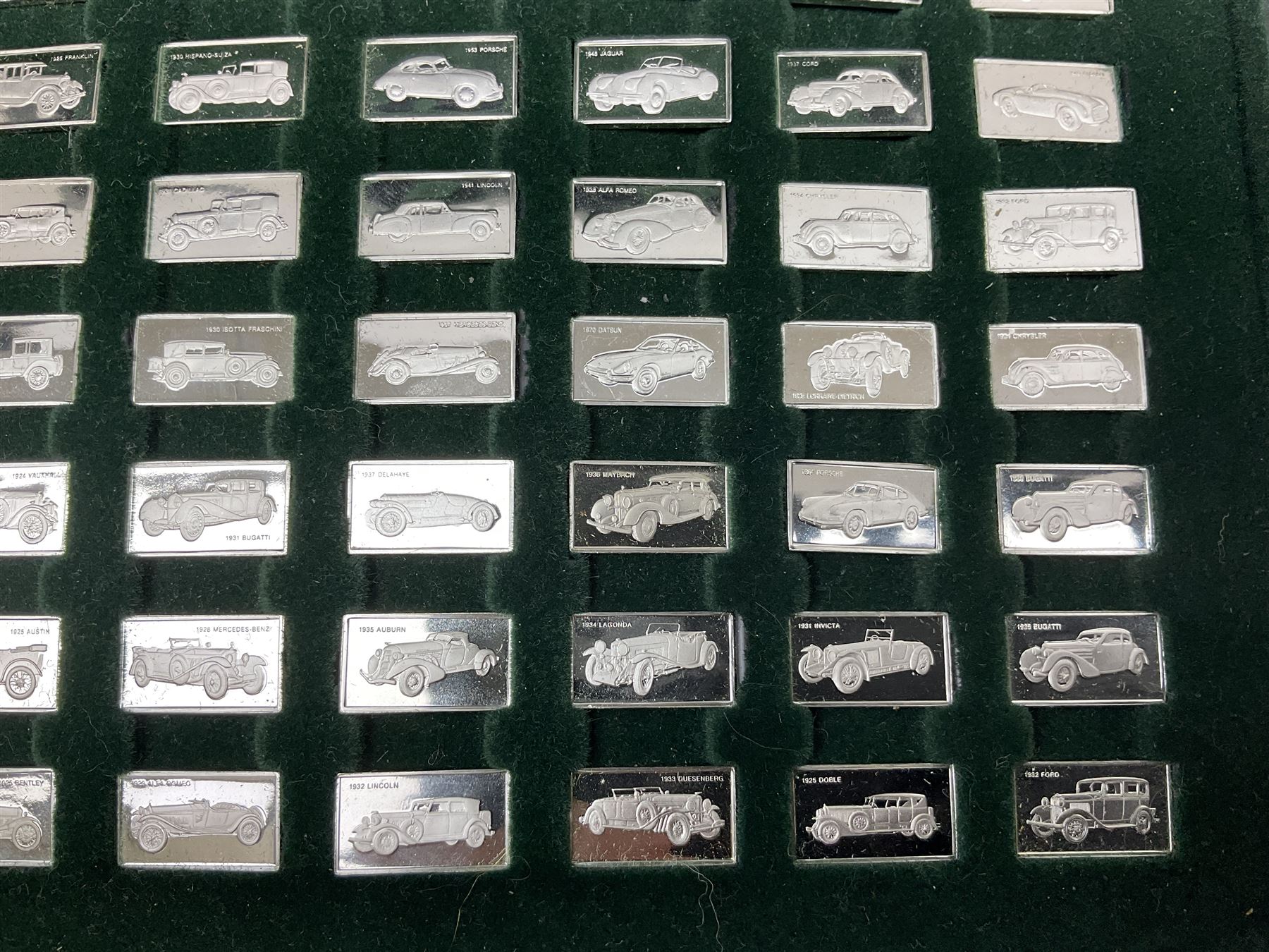 '100 Greatest Cars', set of one hundred silver miniature car ingots by John Pinchers, in presentation box 