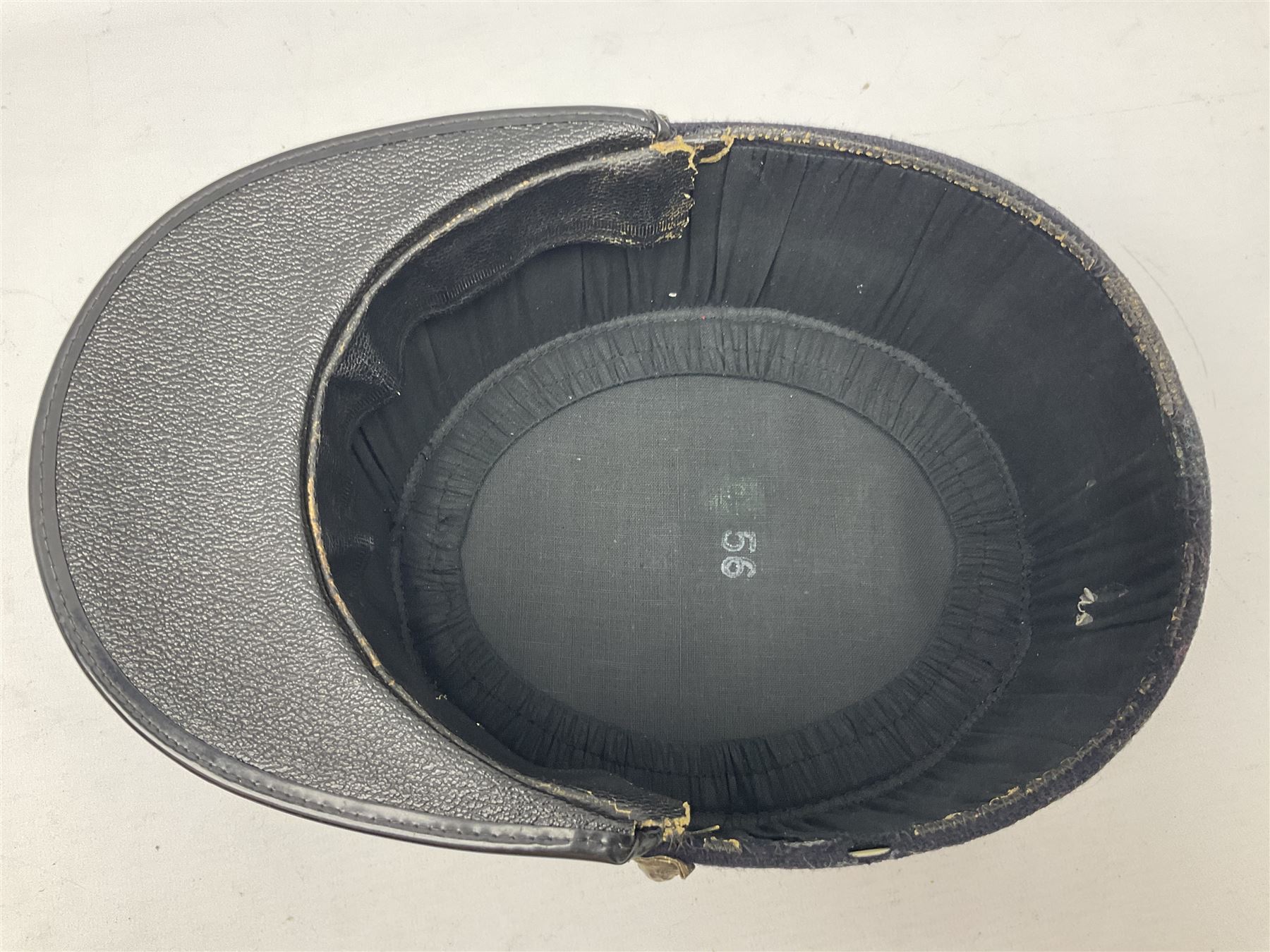 Mid 20th century French Ugeco Nantes first class dress navy blue uniform with ribbon bar with cap, and quantity of Sapeurs Pompiers patches, Sapeurs Pompiers de Caen belt buckle etc