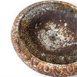 Victorian cast iron garden urn, egg and dart rim with shallow bowl, raised on stepped circular pedestal, finished in weathered white paint 