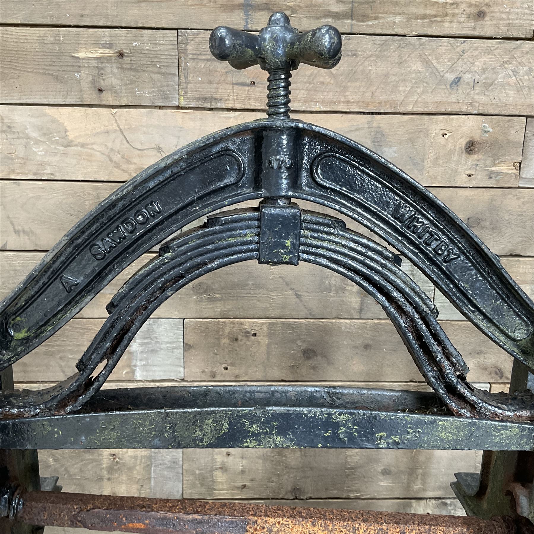 Ewbank cast iron ornamental mangle retailed by A Sawdon Whitby