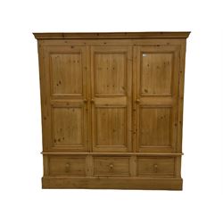 Solid pine triple wardrobe with three drawers