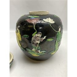 Chinese Famille Noir ginger jar and cover, decorated in relief with the eight immortals among white and mauve lotus flowers and swirling clouds on black ground, with moulded Wang Bing Rong seal mark beneath, H25cm
