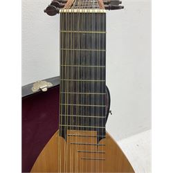 Maurice Vincent Ongar Ireland 17-string lute with segmented maple back, cedar top with Celtic style pierced sound hole and ebony veneer neck L104cm;  in custom-made shaped case