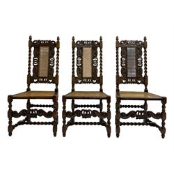 Set six 19th century oak Carolean style dining chairs, the cresting rail with open crown flanked by putto, spiral turned uprights with pineapple finials, canework seat and back, the seat rails carved with foliage, spiral turned supports joined by s-scroll and open crown carved front rail, decorated with flower heads, each with upholstered seat pad