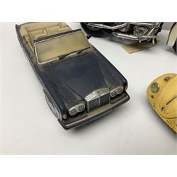 Franklin Mint - three die-cast models comprising 1:10 scale Harley Davidson Heritage Softail motorcycle, 1:24 scale 1957 VW Beetle and 1:24 scale 1993 Rolls Royce Corniche IV; all unboxed (3)