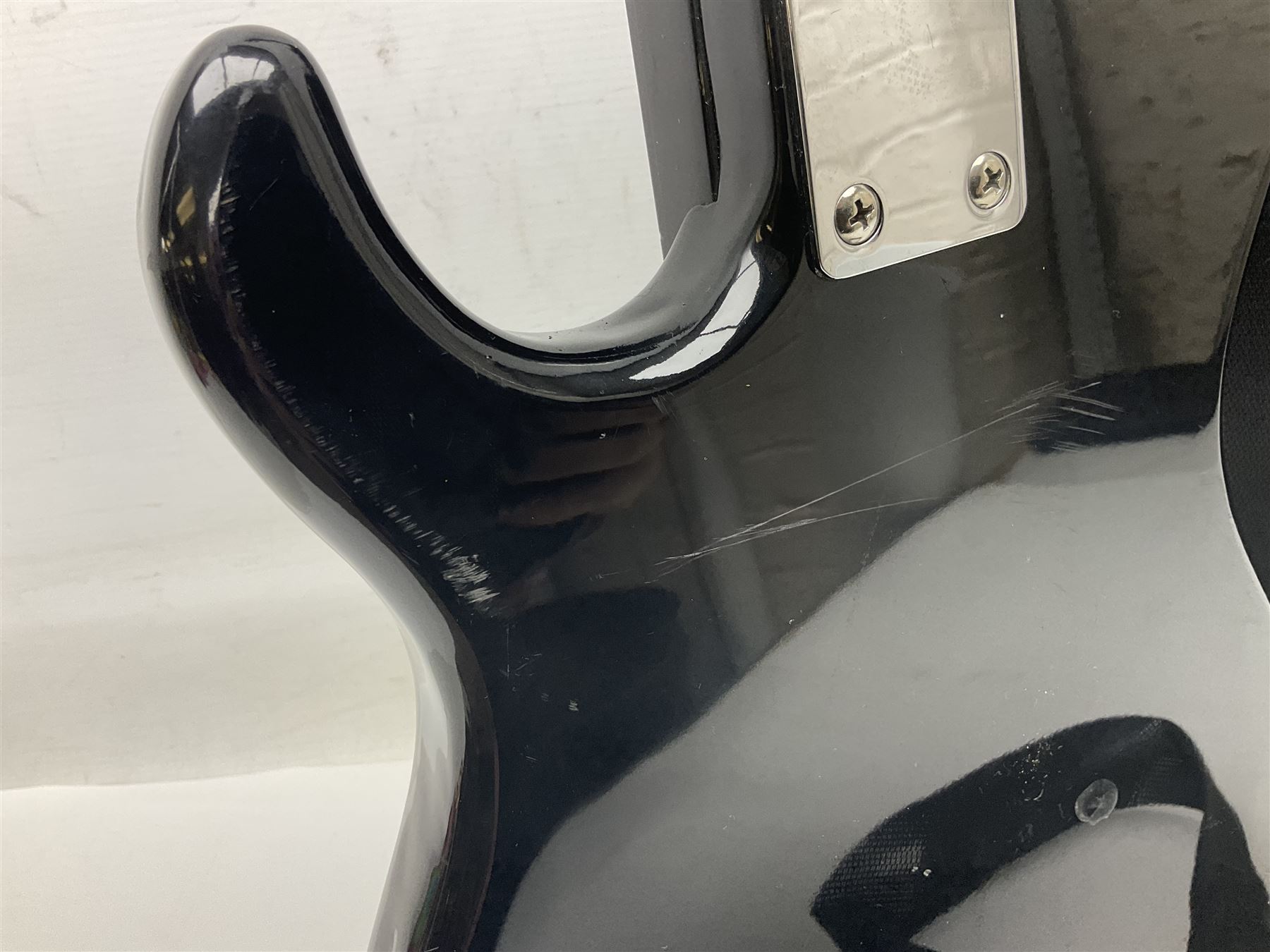 Encore black electric cut-away guitar L96cm; and Spanish Victor Garcia model 187 acoustic guitar, bears label dated 1972 L99cm; each in soft carrying case (2)