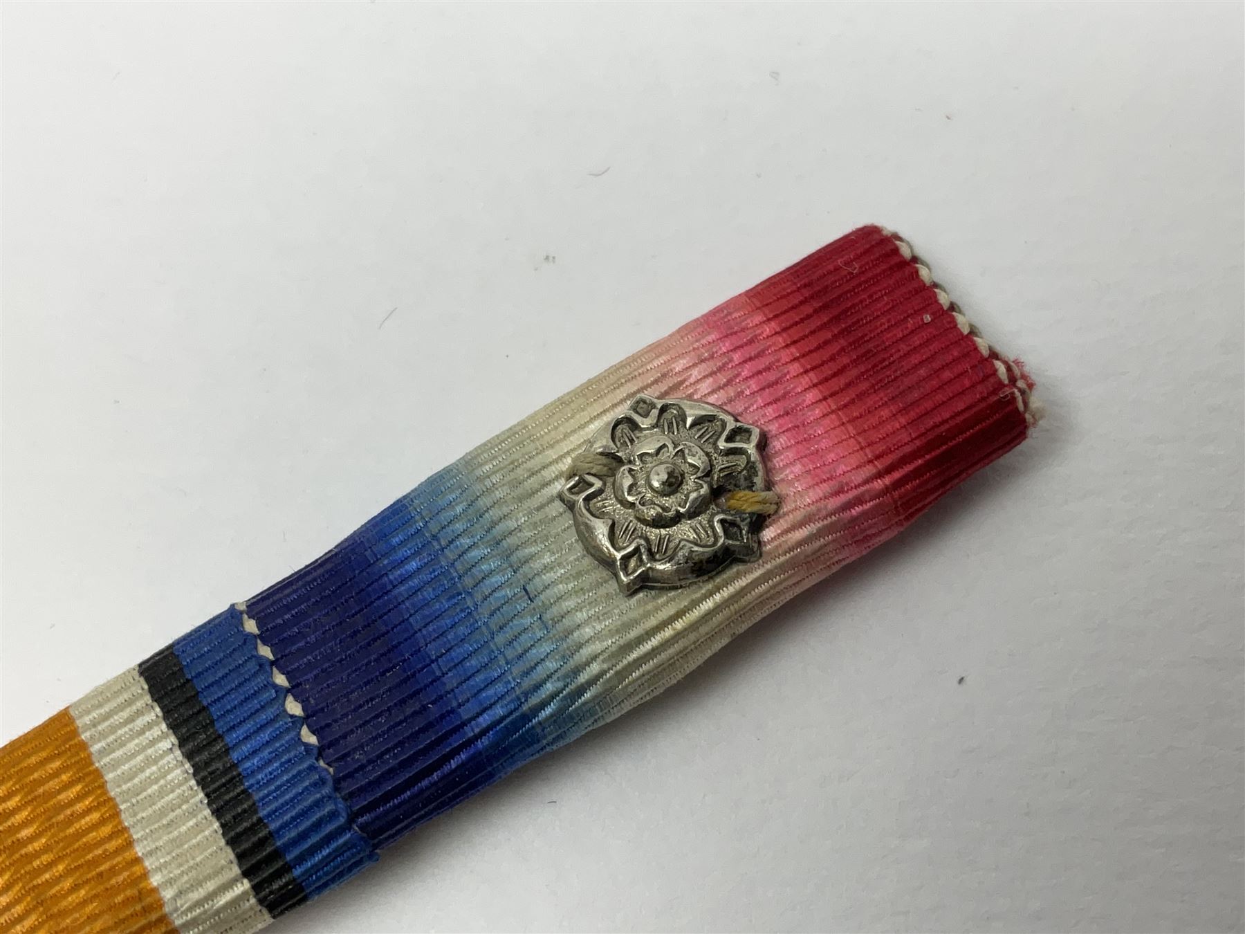 WW1 group of three medals comprising British War Medal, Victory Medal and 1914 Star awarded to 8328 Pte. G. Shaw Yorks: L.I.; on hanging bar with WW2 1939-1945 War Medal and WW1 ribbon bar with rosette to 1914 Star ; all with ribbons; and WW2 1939-1945 War Medal with ribbon