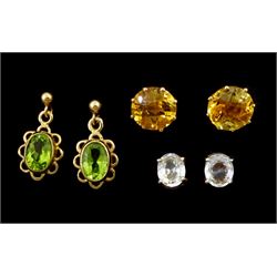 Three pairs of 9ct gold stud earrings including peridot and citrine