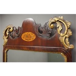  George III mahogany and parcel gilt Pier glass, pediment pierced and carved with acanthus leaf, oval inlaid plaque with flowers, moulded and gilt mirror surround, 52cm x 115cm  