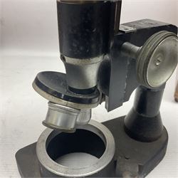 Four microscopes, including Cooke, Troughton & Simms no M467926, W Watson & Sons no 114758, W & J George & Beck Ltd no 36649 and one other 