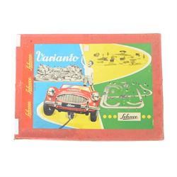 Schuco Varianto 3010 F boxed set, comprising two tinplate vehicles 3044 Varianto-Bus and 3041 Varianto-Limo, road sections, guidewires and signs, boxed