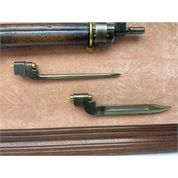 WW2 Lee Enfield No.4 Mk.1 .303 bolt-action rifle with hinged butt compartment, made by SA Ltd., Long Branch, Canada 1942, serial no.5L0646 L113cm; mounted on a framed display board with No.4 Mk.II spike bayonet, No.9 Mk.1 blade bayonet, two inert 5-round clips and brass biographical plaque by Antler Military Originals detailing DA Cert No.C3444 OLD STYLE DEACTIVATION SO FIREARMS CERTIFICATE REQUIRED OR RFD