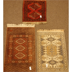  Persian Baluchi geometric design rug/mat (74cm x 64cm), and two Persian design rugs  