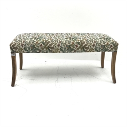 Mid to late century window stool, upholstered in beige ground floral patterned fabric, square tapering outsplayed supports, W114cm, H50cm, D42cm