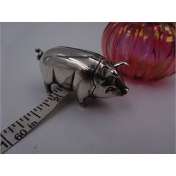 Modern novelty silver tape measure, in the form of a pig, hallmarked CME Jewellery Ltd, together with a silver mounted pink glass scent bottle, signed H. White to base, with silver collar hallmarked Laurence R Watson & Co, Birmingham 1996, scent bottle H12cm