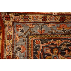  Persian Sarough red ground rug carpet, light blue medallion repeated in border guards, interlacing field, decorated with flower heads, 342cm x 256cm  