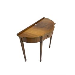 Georgian design mahogany side table, shaped top over two drawers, on square tapering fluted supports with spade feet