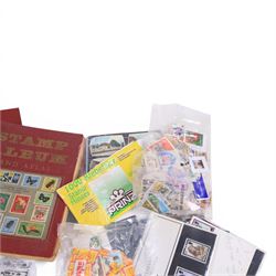 Great British and World coins and stamps, including commemorative two pound and fifty pences, commemorative crowns, loose stamps, etc, in one box