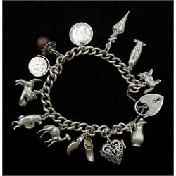 Silver charm bracelet with heart padlock clasp and twelve silver charms including cat, owl and clogs