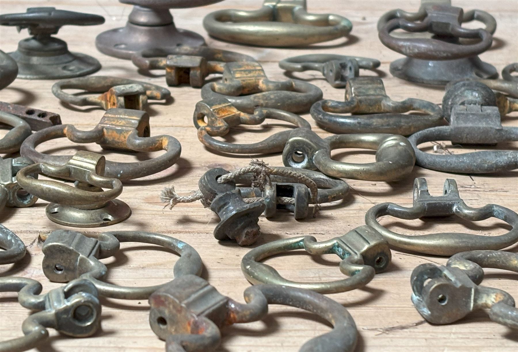 Collection of Georgian brass drop loop handles.  - COLLECTION BY APPOINTMENT FROM: The White House, Thirsk Road, Easingwold, York, YO61 3NF - CALL 01723 507111 TO ARRANGE