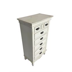 Tall white finish chest, fitted with three small drawers over five long drawers, on turned feet