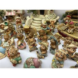 Extensive collection of Pendelfin rabbits and stands, to include Betsy Barge, Fruit Shop, Uncle Soames, Event Piece etc, many with original boxes 