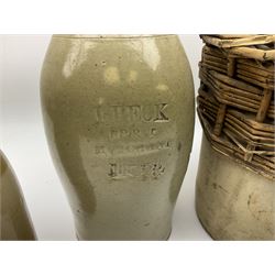 19th century stoneware gin bottle impressed I. Peck, Spirit Merchant Hull H27cm, Victorian salt glazed stoneware jar embossed W. Jefferson Mustard Manufacturer 47 Wincolmlee Hull, part cane covered stoneware flagon for John Smith Market Place Beverley and a Barton-on-Humber stoneware ginger beer bottle (4)  