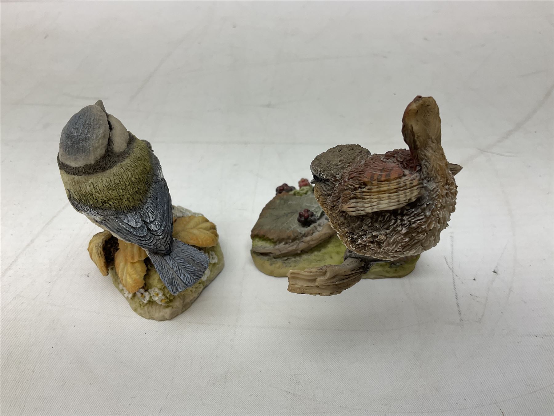 Lladro figure Ingenuine Woman no. 5487 (a/f), Nao figure, Goebel bird figure CV86 1967, Goebel Chaffinch 38023-06, Arden Scultpures robin figure group etc