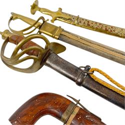 Three Indian swords, including Ceremonial Tulwar style sword with pierced decoration to brass scabbard, etc 