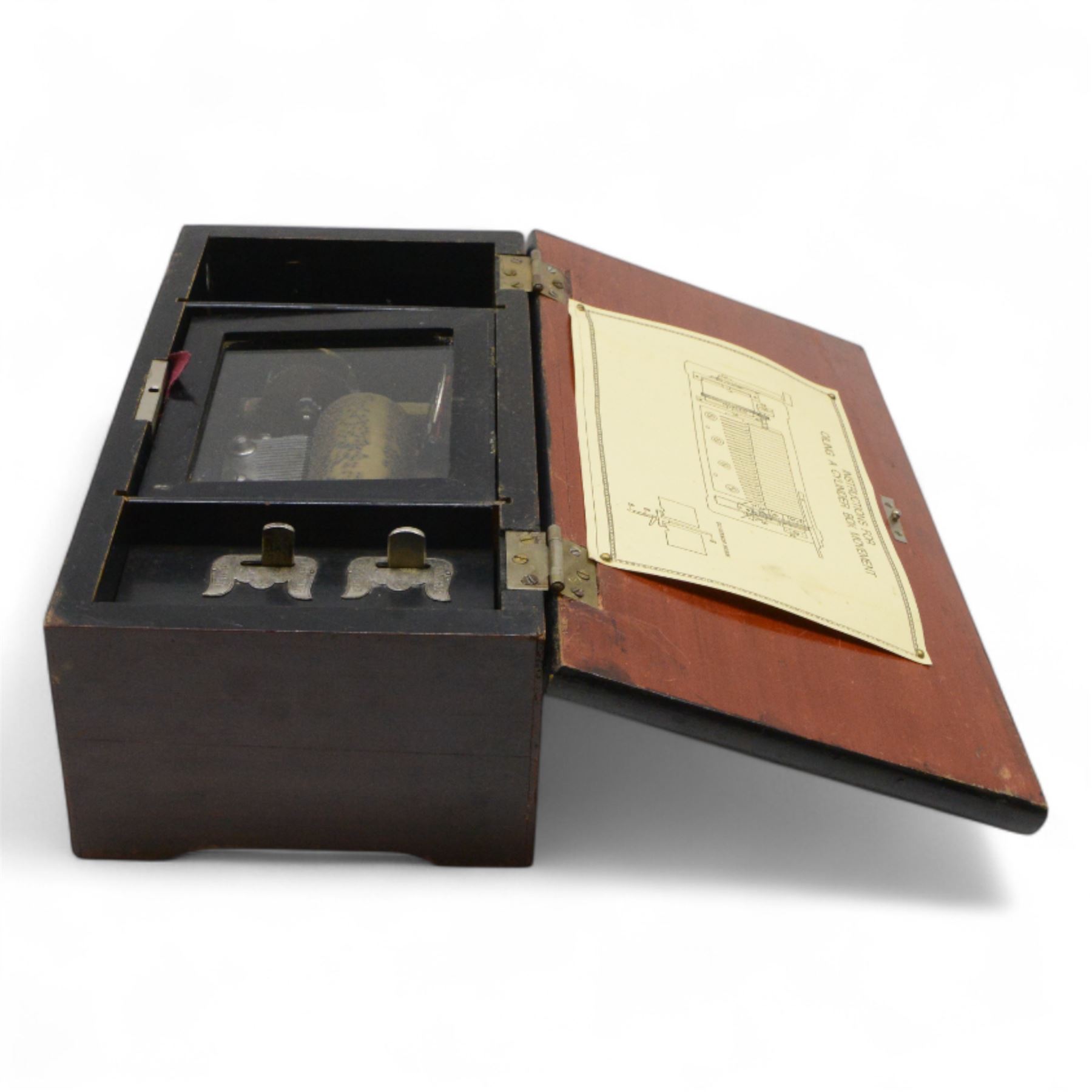 Early 20th century Swiss musical box- in a plain mahogany finished case playing six airs on a 30 tooth steel comb, with a 3-1/4”  pinned cylinder and tune indicator, with play/stop/repeat/change/ levers, crank wound spring driven barrel with Geneva stopwork, case fitted with an internal viewing glass.