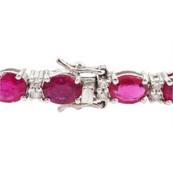 18ct white gold oval cut ruby and round brilliant cut diamond bracelet, total ruby weight approx 9.80 carat, total diamond weight approx 0.50 carat