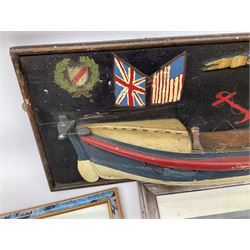 RNLI collection box in the form of a boat makers half block model, painted in the colours of a lifeboat with flag and ship motifs, H25cm, L73cm together with framed photos, postcards and prints of lifeboats and crew, including Scarborough lifeboat station